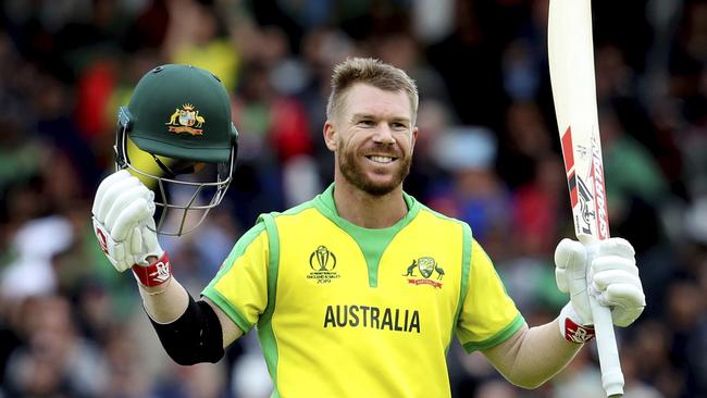 Australia’s David Warner celebrates his century against Bangladesh. Picture: AP