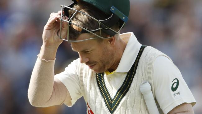 David Warner leaves the field after being dismissed on day four. Picture: AP