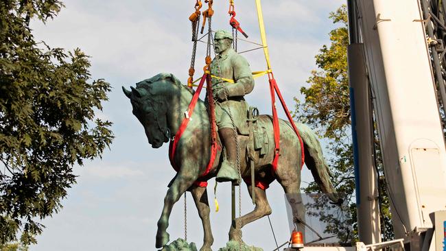 The statue of Confederate General Robert E. Lee is removed from a park in Charlottesville, Virginia. Picture: Getty Images.