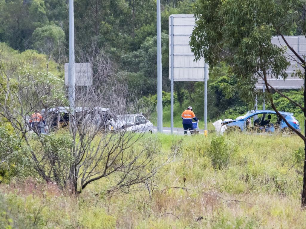 Police at the scene of a horror crash on the Centenary Highway. Picture: Richard Walker.