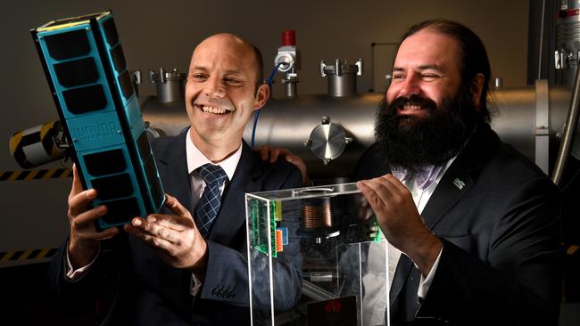 Matthew Tetlow (CEO Inovor Technologies) holding a 3U Cubesat and Dr Patrick Neumann (Chief Scientist - Head of R&amp;D) with a demo of the pulsed cathodic arc thruster. Picture: Tricia Watkinson