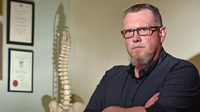 Chiropractor Julian Foster is struggling to run his business after NBN cut his phone line. Picture: Troy Snook