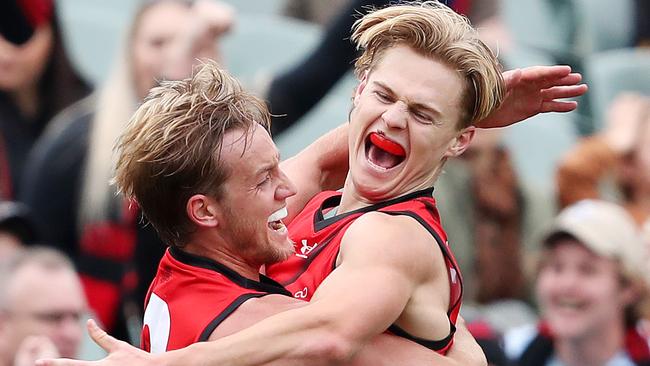 AFL - Sunday, 26th July, 2020 - Adelaide Crows v Essendon at the Adelaide Oval. Essendon's Ned Cahill celebrates his first goal with Essendon's Darcy Parish Picture: Sarah Reed