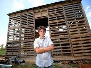 Angus Hughes is constructing a building out of used pallets and other recycled materials. Photo Allan Reinikka / The Morning Bulletin. Picture: Allan Reinikka