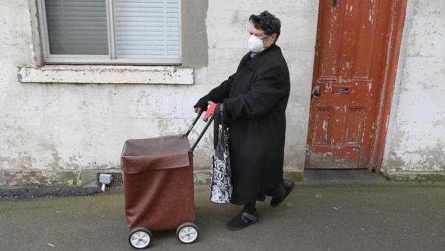 A woman goes shopping in South Melbourne. Picture: NCA NewsWire / David Crosling