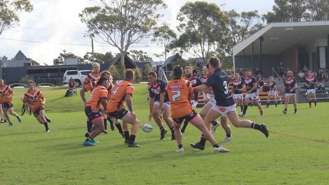 Erina Eagles halfback Cameron Davies puts in a grubber during the team's round four clash with The Entrance Tigers in the Central Coast Community Rugby League first grade competition at EDSACC Oval, on 23 April 2023. Photo: Alex Pichaloff.