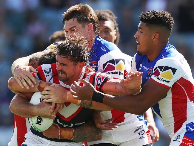 Connor Watson of the Roosters is swamped by Newcastle defenders. Picture: Getty Images