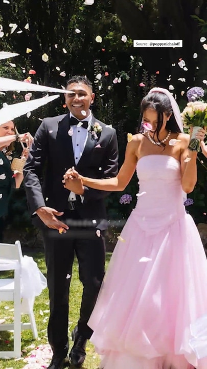 Poppy Radbone wows in pink wedding dress