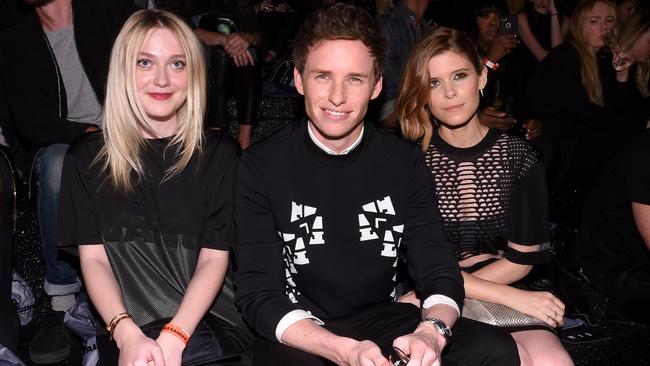 (L-R) Actors Dakota Fanning, Eddie Redmayne, Kate Mara attend the Alexander Wang X H&amp;M Launch on October 16, 2014 in New York City. (Photo by Andrew H. Walker/Getty Images for H&amp;M)