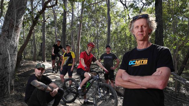 Gold Coast Mountain Bike Club president Dr Chris Thompson (right) and other Nerang State forest trial riders and users concern at what is happening to the tracks. Picture Glenn Hampson