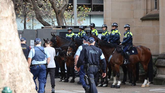 Police in position at Sydney Town Hall. Picture: David Swift