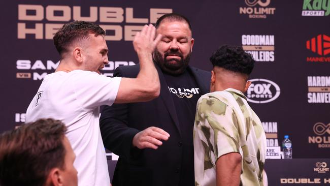 Goodman slaps Schlieb after the pair clashed in a heated exchange. Picture: No Limit Boxing