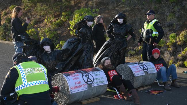 REBELS: Three women and one man have been arrested following a protest in New Town. Picture: Kenji Sato