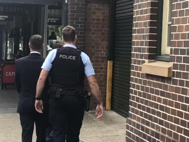 Jason Garnard Wilks, 54, of Cromer, being led into Manly Police Station after being convicted and jailed for high range drink driving and driving while suspended in Manly Local Court. Picture: Manly Daily