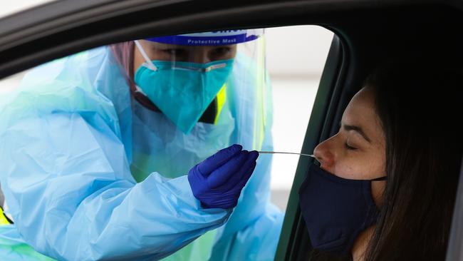 A nurse performing a Covid-19 test at the Bondi Beach in Sydney. Picture: NCA NewsWire / Gaye Gerard