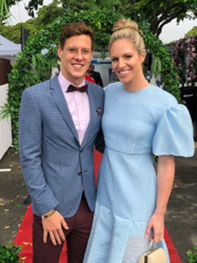 The couple pictured at the Doomben Racecourse just months before their split.