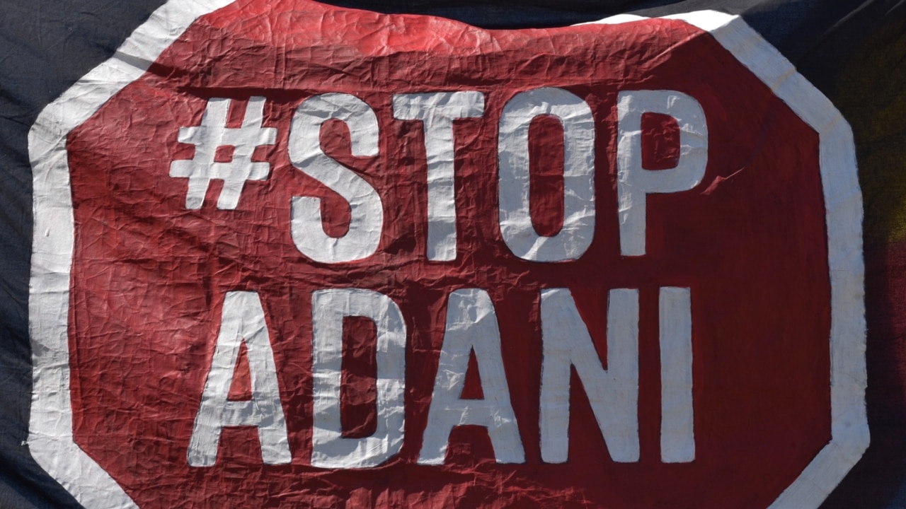 Adani protestors set up cake stand blockade