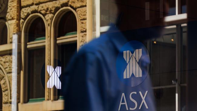 SYDNEY, AUSTRALIA - NewsWire Photos, October 29 2024. GENERIC. Stocks. Finance. Economy. People walk past the Australian Stock Exchange, ASX, on Bridge Street. Picture: NewsWire / Max Mason-Hubers