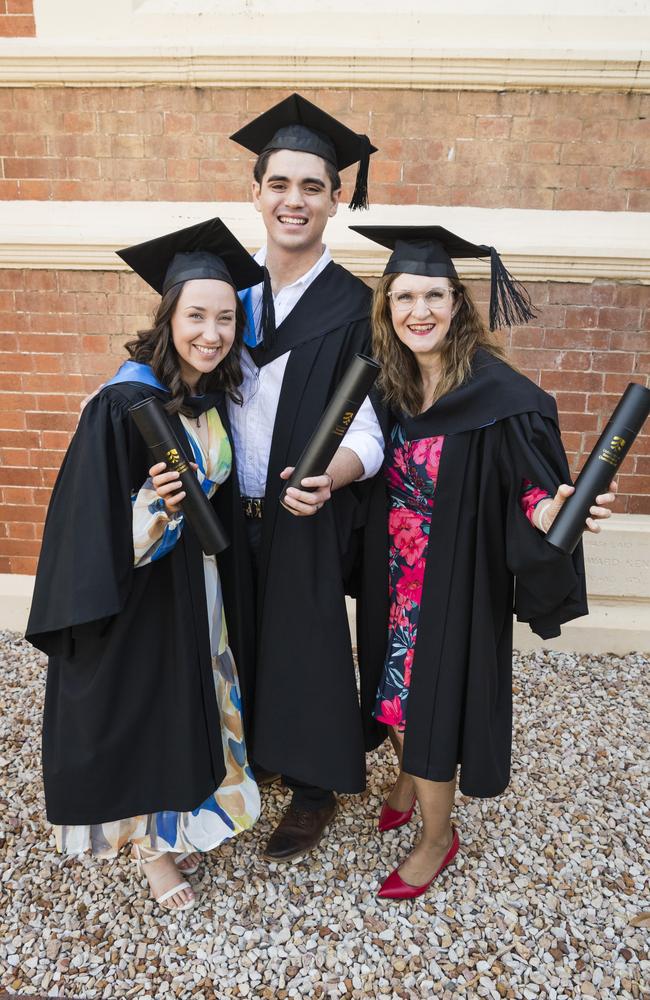 Bachelor of Nursing graduate Louise McDonald (right) with fellow graduates daughter Sophie Edser and son-in-law Ryley Edser at the UniSQ graduation ceremony at Empire Theatres, Tuesday, October 31, 2023. Picture: Kevin Farmer