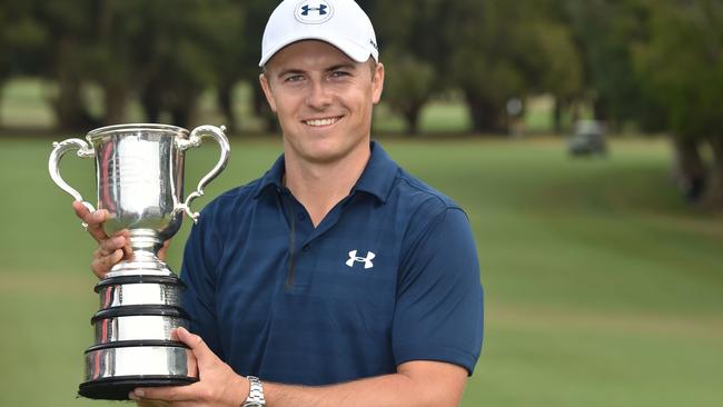 US golfer Jordan Spieth posing with the Stonehaven Cup after winning the 2016 Australian Open in Sydney. Picture: AFP/ Peter Parks