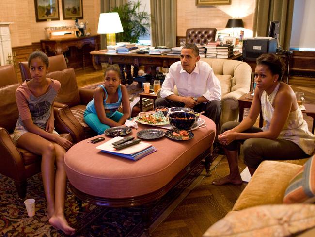 President Barack Obama and first lady Michelle Obama with their daughters Sasha and Malia watch the World Cup soccer game between the U.S. and Japan, from the Treaty Room office in the residence of the White House July 17, 2011 in Washington, DC. The U.S. lost to Japan in a shootout. Picture: Pete Souza/The White House
