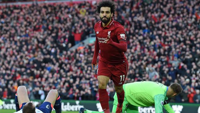 Liverpool’s Mohamed Salah celebrates after scoring his side’s third goal against Bournemouth at Anfield. Picture: AFP