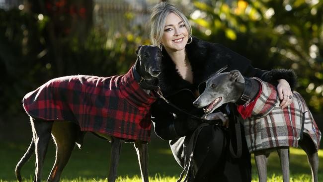 Stylist Erin Paige Stevenson from Dolly Up Vintage Clothing, in Centennial park with her rescue Greyhounds Harry and Pixie.  Why I love my suburb. Picture: John Appleyard