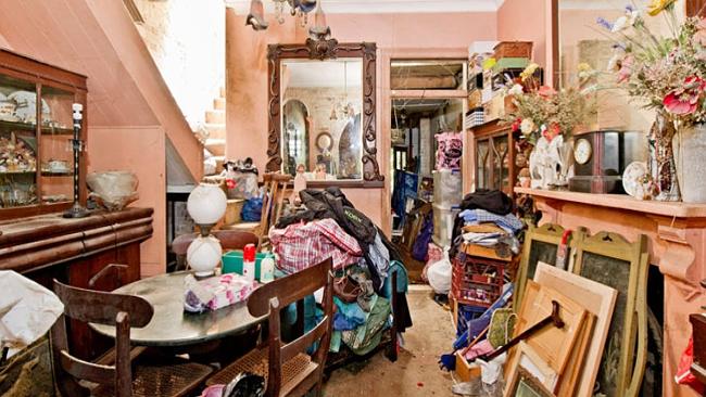 This hoarder’s home in Darlinghurst sold for $1.05 million recently despite its rundown condition.