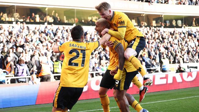 Wolverhampton Wanderers Mario Lemina celebrates with teammate. Photo by Darren Staples / AFP.