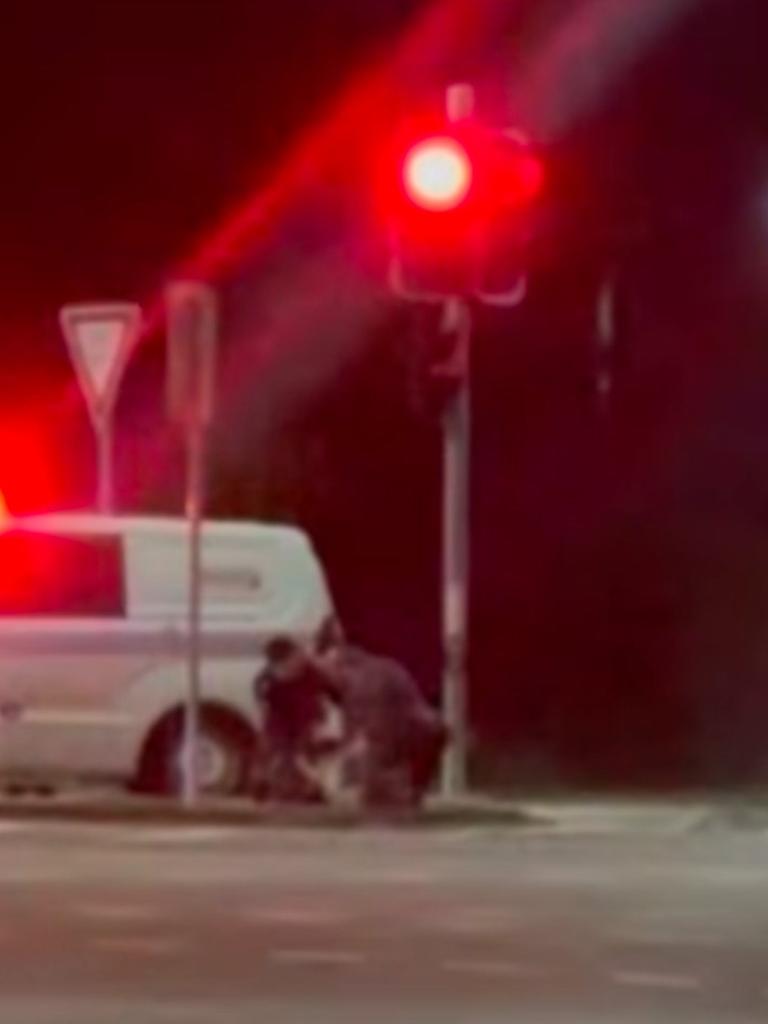 A video has shown the moment police tackled a man at the intersection of Old Coach Rd and Days Rd in Upper Coomera around 10pm on Thursday. Photo: Facebook/Tom Meschede