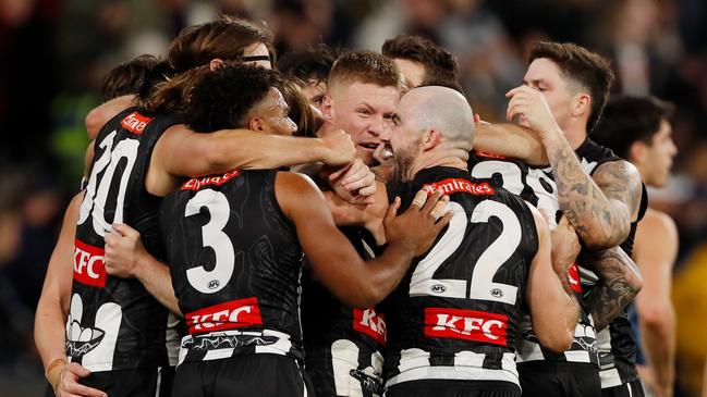 Collingwood celebrate after defeating Carlton on Sunday. (Photo by Dylan Burns/AFL Photos via Getty Images)