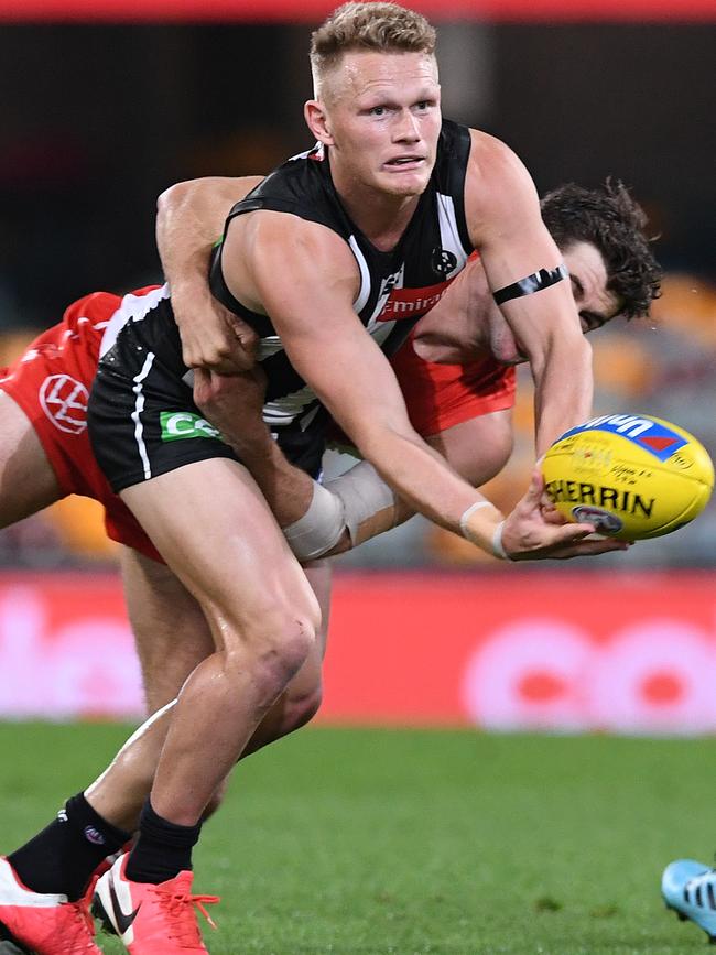 Adam Treloar is being pushed out against his will.