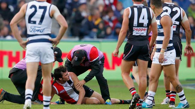 Doctors, teammates and opponents show concern after the initial collapse. Picture: Getty Images