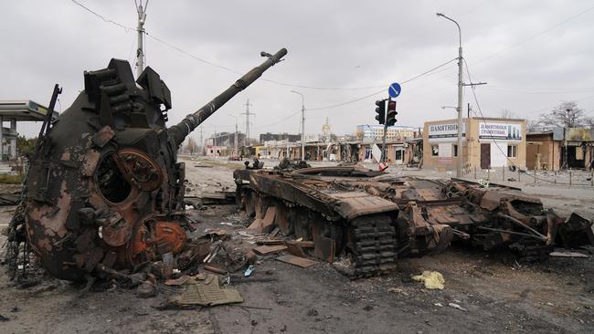 A wrecked tank is seen as civilians are being evacuated along humanitarian corridors from the Ukrainian city of Mariupol, which is expected to fall to Russian forces within days. Picture: Getty Images