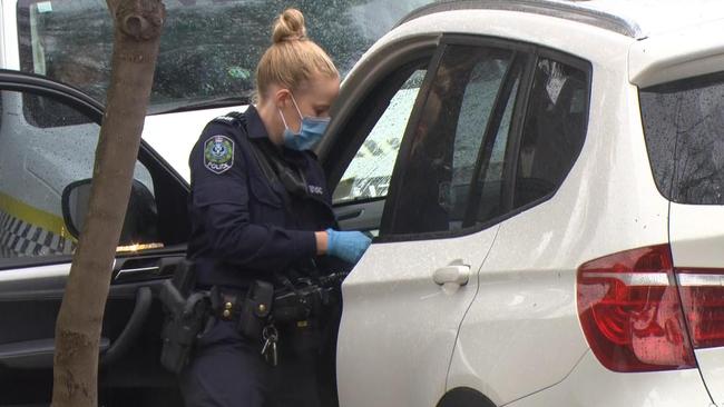 Police search for evidence after the boy and his mother were stabbed during the violent car robbery outside their Unley home. Picture: 7NEWS