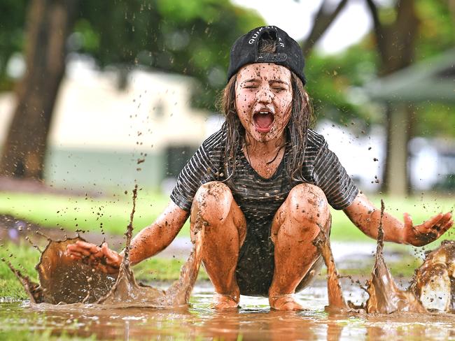 Lila Knott age 7  has some fun in the water in New Farm Park after the storm that hit Brisbane today.Thursday January 16, 2020. (AAP image, John Gass)