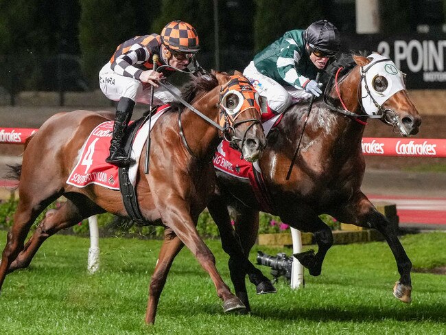 Southport Tycoon (orange) grabs Growing Empire in the shadows of the post to win the Manikato Stakes at The Valley on Friday. Photo: George Salpigtidis/Getty Images.