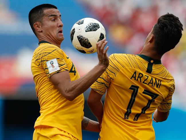 Daniel Arzani (right) and Tim Cahill were Socceroos teammates at the 2018 World Cup. Picture: AFP / Adrian Dennis