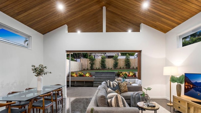 The raked ceiling with glass window dividers at 16 Sunflower St, Wynnum.