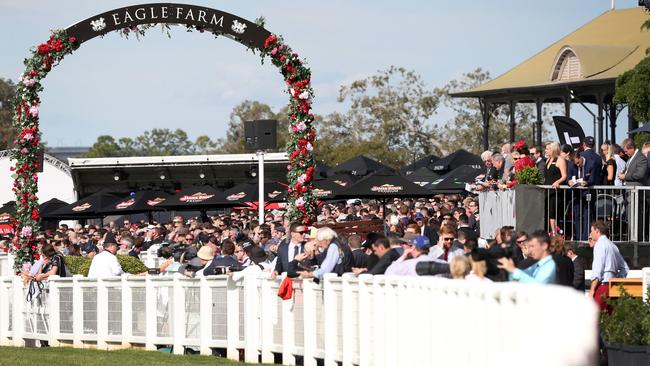 A crowd of more than 20,000 showed up for the reopening of Eagle Farm on Saturday. Picture: Jono Searle.