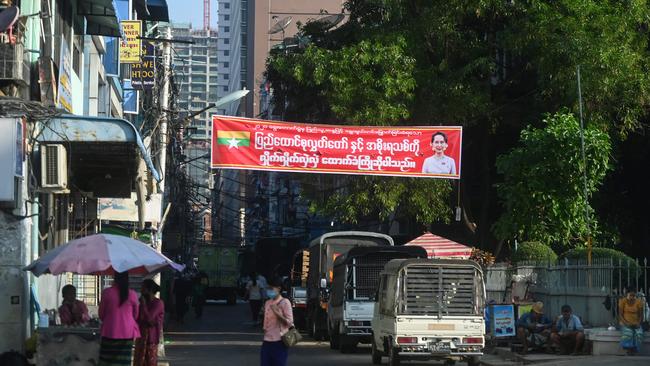 A banner supporting the country's de facto leader Aung San Suu Kyi is pictured on a street in Yangon on February 1, 2021, as the military says it is taking control of the country. Picture: STR/AFP