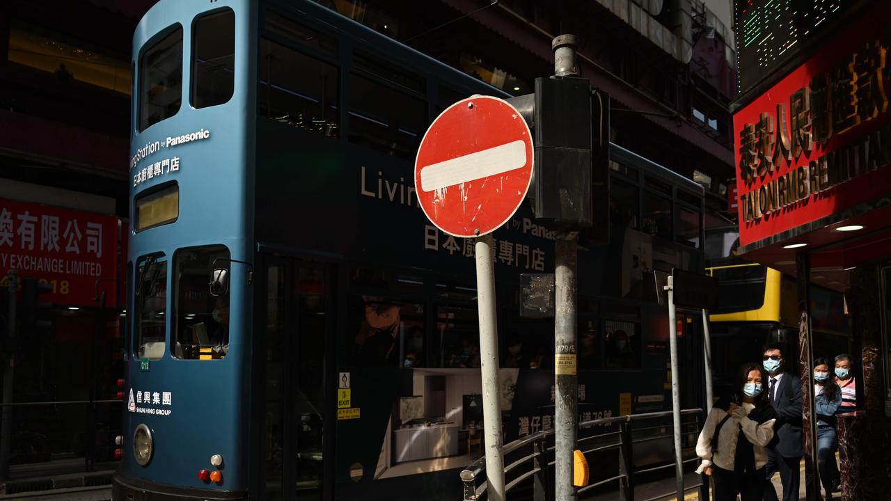 One of Hong Kong’s famous trams. New restrictions have been introduced in the city to try and dampen the spread of Omicron. (Photo by Peter PARKS / AFP)