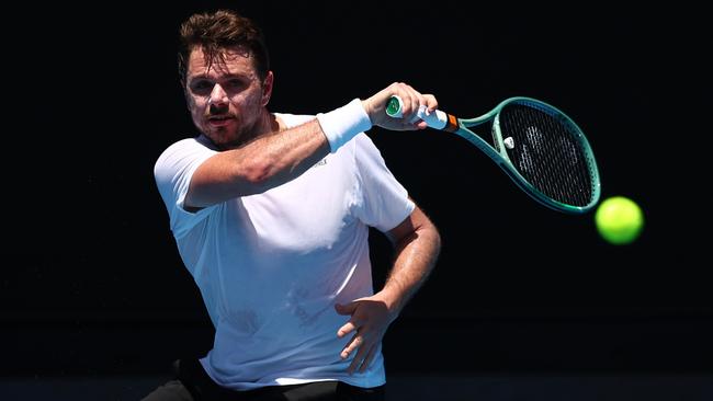 MELBOURNE, AUSTRALIA - JANUARY 06: Stan Wawrinka of Switzerland plays a forehand during a training session ahead of the 2024 Australian Open at Melbourne Park on January 06, 2024 in Melbourne, Australia. (Photo by Graham Denholm/Getty Images)