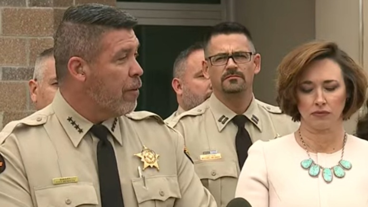 Sheriff Adan Mendoza (left) and Dr Heather Jarrell (right) address reporters today.