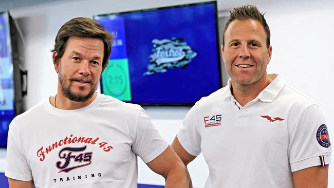 Former F45 owner Rob Deutsch with actor Mark Wahlberg, who bought a minority stake in the company in 2019. Picture: Instagram / F45 Training.