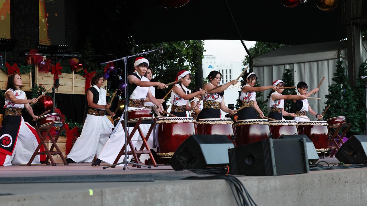 Drum Infinity Japanese drumming group open the Carols in the Park, held at Munro Martin Parklands. Picture: Brendan Radke