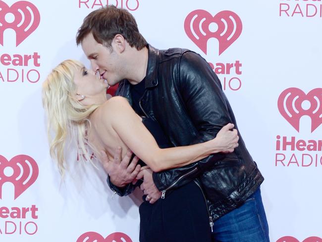 Chris Pratt can’t keep his hands off wife Anna Faris. (Photo by Bryan Steffy/Getty Images for iHeartMedia)