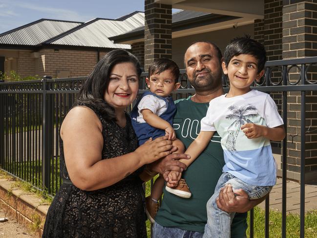 Sukhdeep Kaur, Aevin, 11 months, Sandeep Singh and Armin, 4 outside their home in Munno Para, Friday, Feb. 25, 2022. Picture: MATT LOXTON