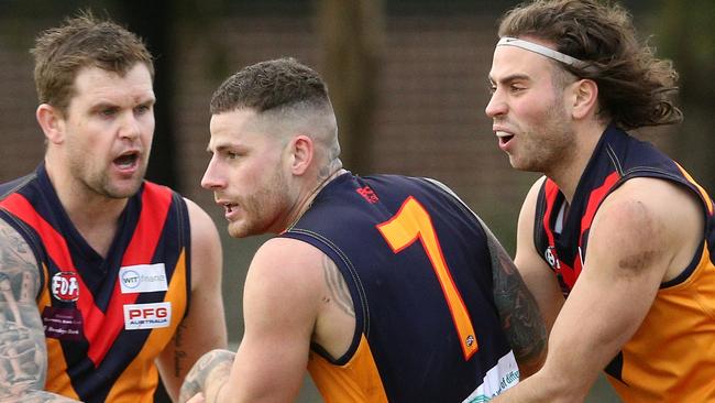 Victor Micallef (centre) was named the best player on the ground for East Keilor. Picture: Hamish Blair