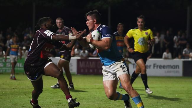 Gold Coast Titans player Beau Fermor pushes away Burleigh Bears player Shallin Fuller during a pre-season trial at Pizzey Park. February 20, 2021. Photo Jason O'Brien